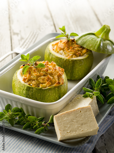 Photo: Zucchinis stuffed with tofu cheese, vegetarian food Zucchinis stuffed with tofu cheese, vegetarian food
