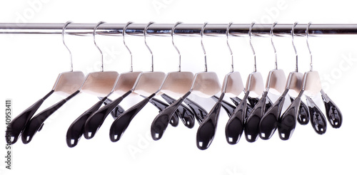 Photo: Plastic pegs for clothes on white background. Plastic pegs for clothes on white background.