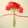 Stylized vintage card with beautiful red tulips and bow Stylized vintage card with beautiful red tulips and bow