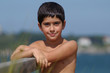 cute child with sunscreen at the beach