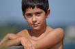cute child with sunscreen at the beach