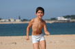 Chid running on beach