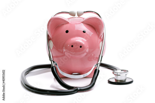 Photo: Piggy bank with stethoscope Piggy bank with stethoscope