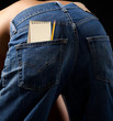 A blank notebook & pencil in jeans pocket