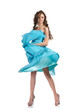 Photo of beautiful girl  in the sky-blue dress isolated on white