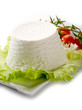 ricotta with tomatoes and lettuce on dish