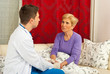 Doctor talking with patient home