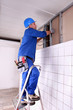 Construction worker panelling wall Construction worker panelling wall