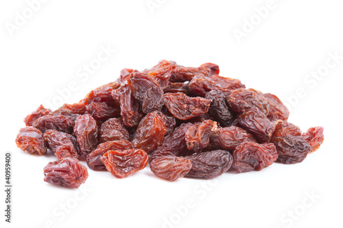 Photo: Raisins isolated on white background. Raisins isolated on white background.