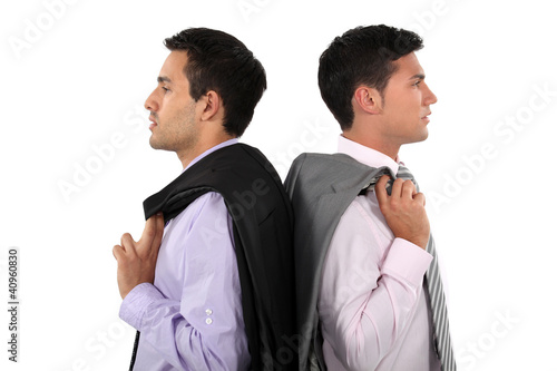 Photo: Businessmen back-to-back Businessmen back-to-back