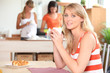 Woman eating breakfast