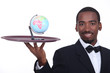 Waiter with miniature globe of tray Waiter with miniature globe of tray