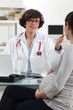 pregnant woman with gynecologist