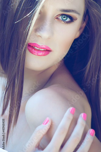Photo: woman with long hair an pink make-up woman with long hair an pink make-up