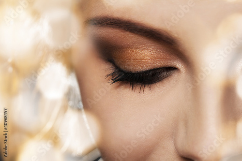 Photo: Woman face with beautiful makeup Woman face with beautiful makeup