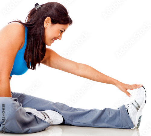 Photo: Fit woman stretching Fit woman stretching