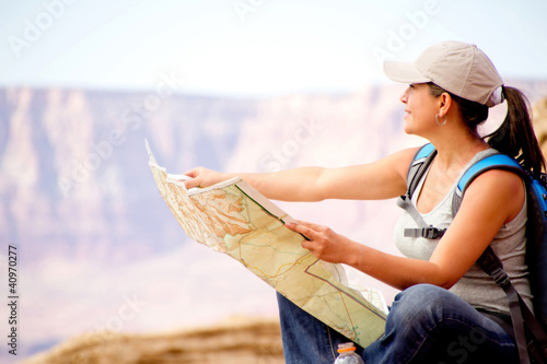 Photo: Female tourist with a map Female tourist with a map