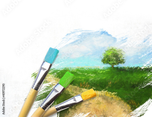 Photo: Artist brushes with a half finished painted landscape canvas Artist brushes with a half finished painted landscape canvas