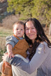 Mother and baby son outdoors