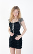 the blonde in a black dress