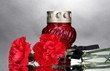 Memory lantern with candle,  carnations and black ribbon