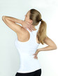 Pretty woman is stretching her spinal and her neck