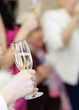 Woman holding glass with champagne