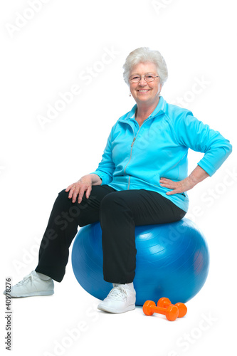 Photo: Attractive senior woman at health club Attractive senior woman at health club
