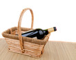 picnic basket with bottle of red dry wine