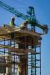 Two workmen on construction site