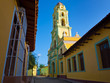 Colorful street and church in the town of Trinidad in Cuba
