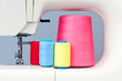 Sewing machine and a set of thread reels Sewing machine and a set of thread reels