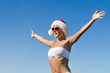 Santa girl wearing heart shaped sunglasses