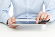 Young adult using digital tablet
