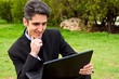 Young man is working on laptop. Young man is working on laptop.