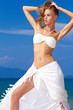 Attractive woman with scarf around her waist