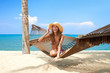 Vivacious beautiful woman in hammock