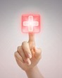 Hand pushing medical button