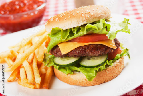 Photo: Classic hamburger with french fries Classic hamburger with french fries