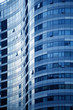 The part of abstract building with mirrored blue sky
