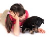 Girl with small puppy dog