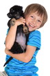 Foto: Happy young boy with pet dog Happy young boy with pet dog