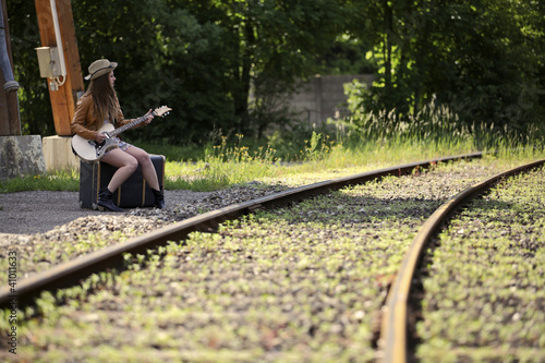 Foto: Mädchen mit Gitarre Mädchen mit Gitarre