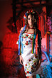 Beauty young bride dressed in elegance national wedding dress