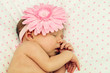 Adorable sleeping newborn baby girl
