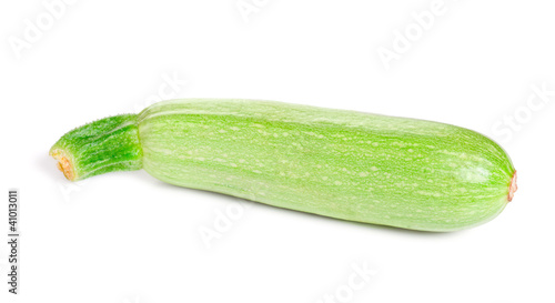 Photo: Green fresh Zucchini isolated on white background Green fresh Zucchini isolated on white background
