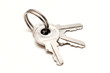 a bunch of metal keys isolated on white background