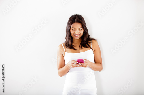 Photo: Woman texting Woman texting