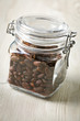 cocoa beans in glass jar cocoa beans in glass jar