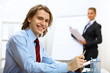 Young businessman at work in office